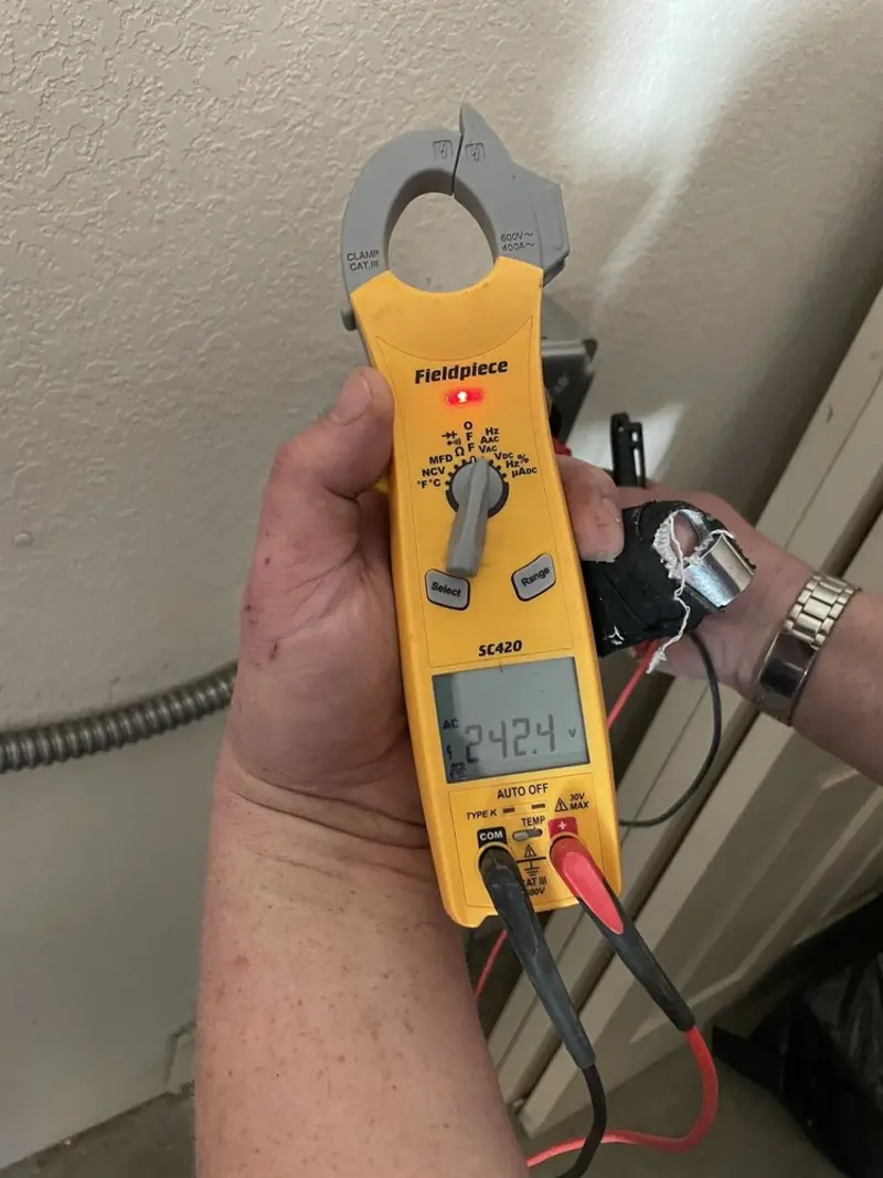 Voltage testing with clamp meter during Hot Tub / Pool Electrical Wiring in Westerville